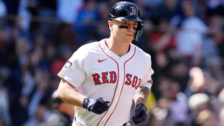 Boston Red Sox's Tyler O'Neill runs on his solo home...
