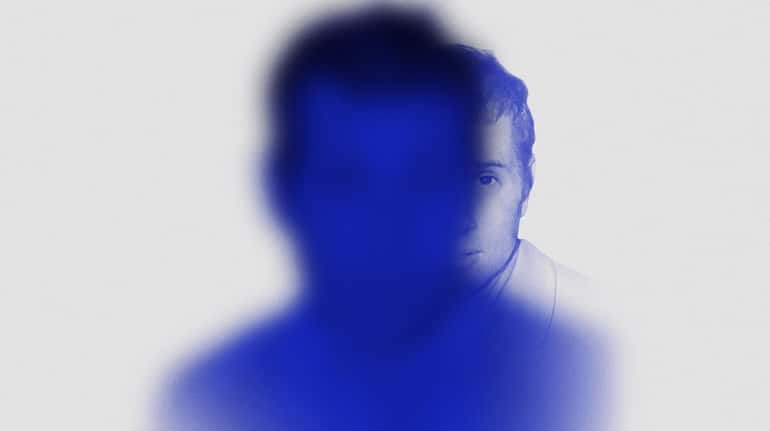 Paul Simon's new album "In the Blue Light" reinterprets songs...