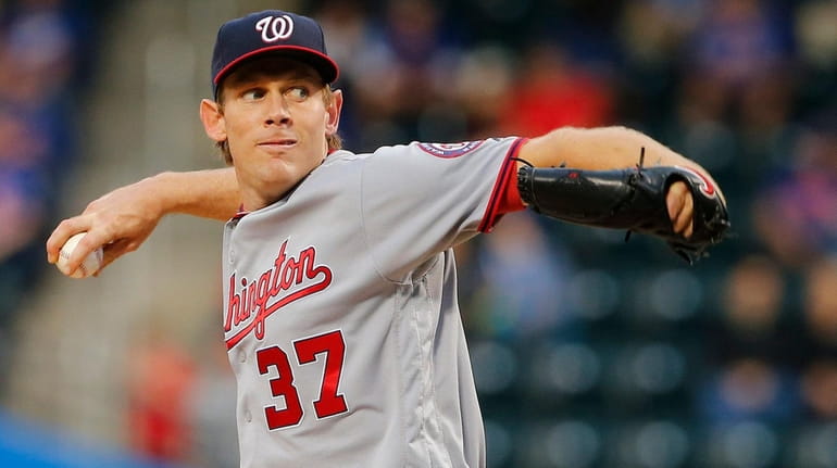 Pitcher Stephen Strasburg of the Washington Nationals delivers a pitch...