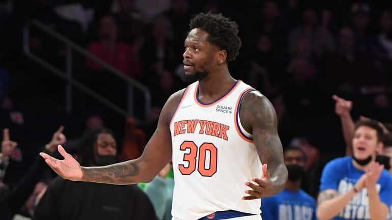 New York Knicks forward Julius Randle reacts during overtime against...