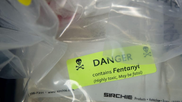 Bags of heroin, some laced with fentanyl, are on display...