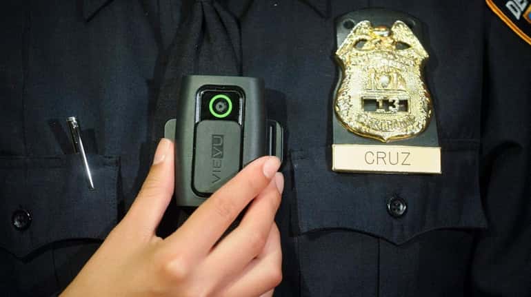 New York Police Department Sgt. Andrea Cruz wears the Vievu...