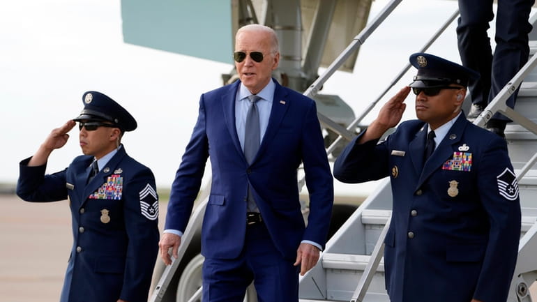 President Joe Biden arrives on Air Force One Wednesday March...