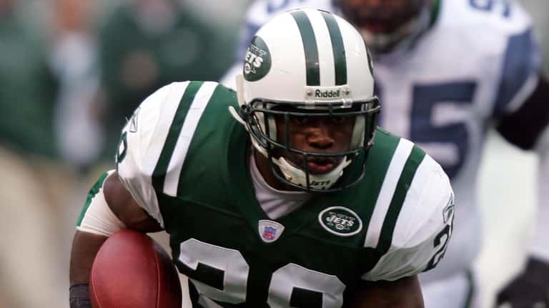 Jets running back Curtis Martin runs the ball for a...