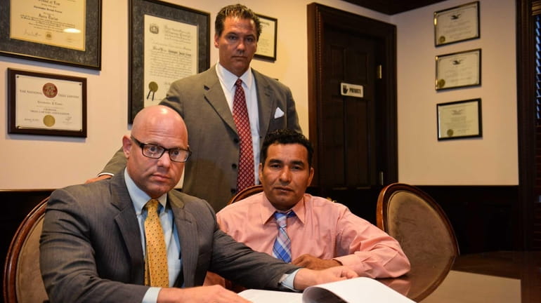 Lawrence S. Youshah, of Nassau County, left, and Jose Medrano...