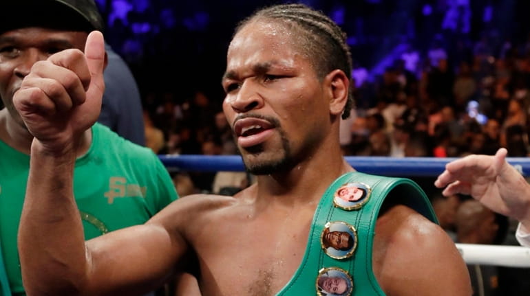 Shawn Porter gestures to supporters after a WBC welterweight championship...