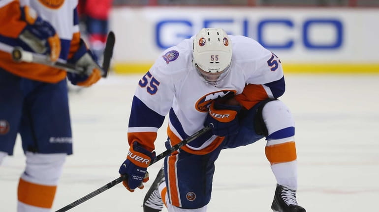 Johnny Boychuk #55 of the New York Islanders reacts at...