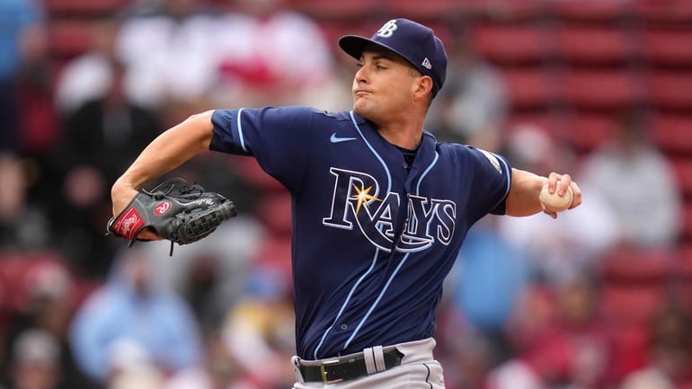 Tampa Bay Rays starting pitcher Shane McClanahan delivers during the...