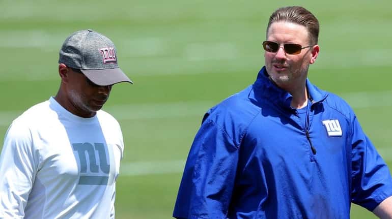 Ben McAdoo looks against the Oakland Raiders at Oakland-Alameda County...