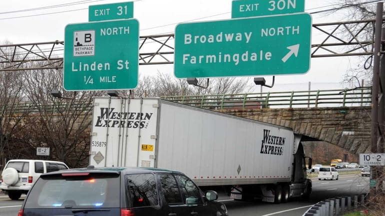 A tractor trailer stuck under a bridge on the Southern...