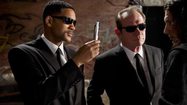 Will Smith (left) and Tommy Lee Jones star in Columbia...