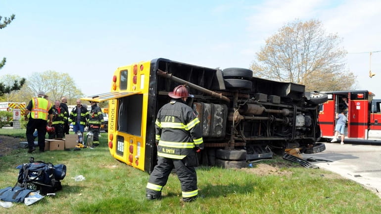 Firefighters at the scene of an accident involving a mini-school...