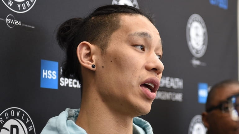 Brooklyn Nets guard Jeremy Lin speaks to the media on...