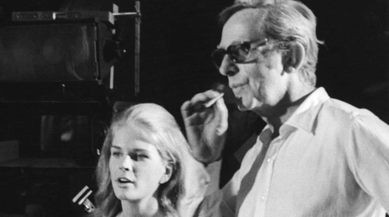 Actress Candice Bergen and director Lewis Gilbert on the set...