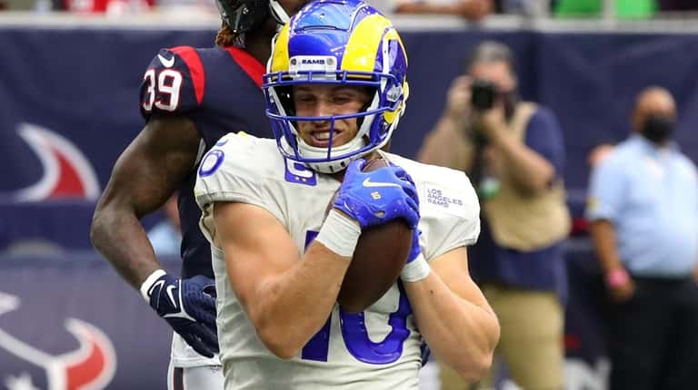Cooper Kupp of the Rams catches the ball for a touchdown...