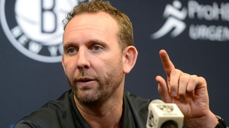 Nets general manager Sean Marks speaks with reporters at the HSS...