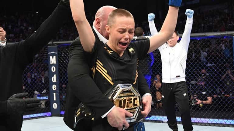 Rose Namajunas reacts after defeating Zhang Weili of China in...