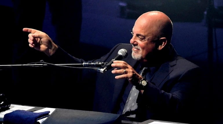 Billy Joel performs before a sold-out crowd at the Nassau...
