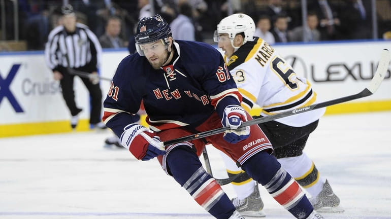Rangers' Rick Nash skates against the Boston Bruins in the...