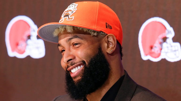 The Browns' Odell Beckham answers questions during a news conference...