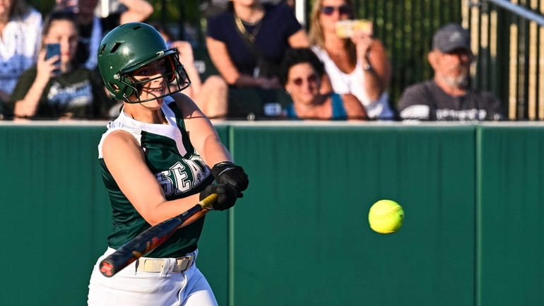 Kaitlyn Young of Seaford drives in the winning run during the...