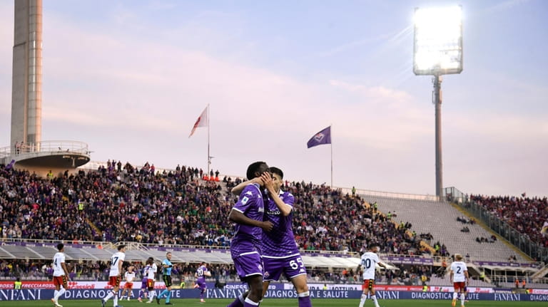 Fiorentina's Jonathan Ikone celebrates scoring his side's opening goal during...