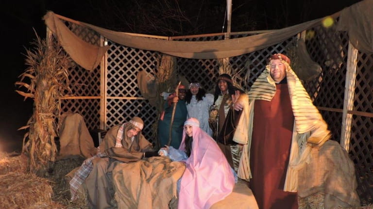 A drive-thru Nativity scene takes place at the Stony Brook Christian...