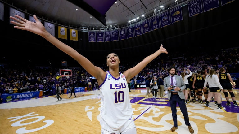 LSU forward Angel Reese (10) waves to the crowd after...