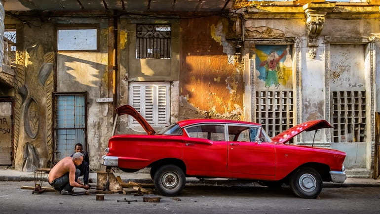 “Cuban Repair Shop” is one of the photos featured in...
