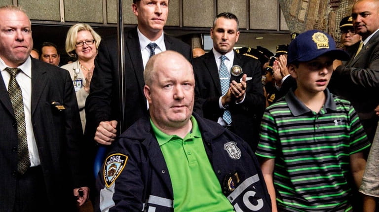 NYPD Officer Brian O'Donnell is pictured leaving Bellevue Hospital Friday,...