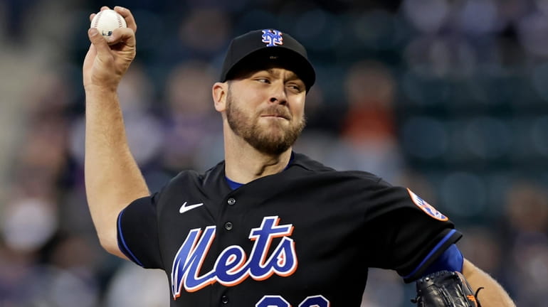 Mets pitcher Tylor Megill throws during the first inning against the...