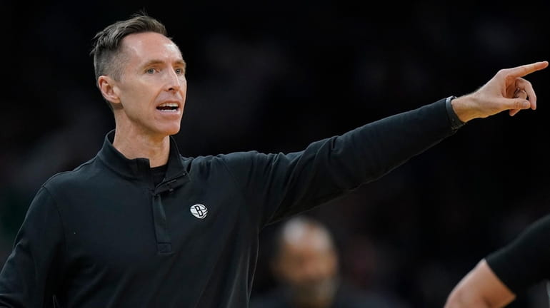 Nets head coach Steve Nash shouts from the bench in...