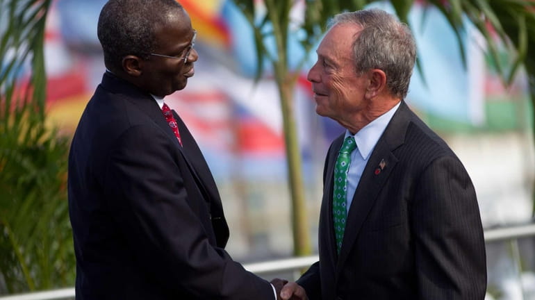 New York mayor Michael R. Bloomberg, right, and Babatunde Fashola...