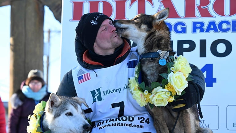 Dallas Seavey celebrates his win in the Iditarod Trail Sled...