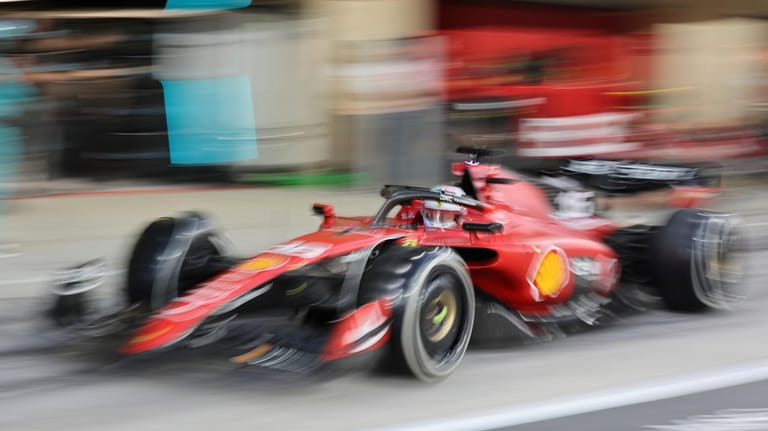 Ferrari driver Charles Leclerc of Monaco steers his car after...