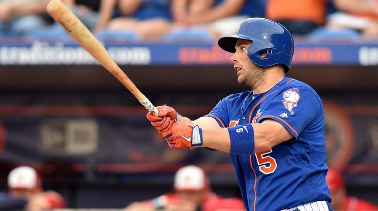 David Wright connects for one of his two hits during...