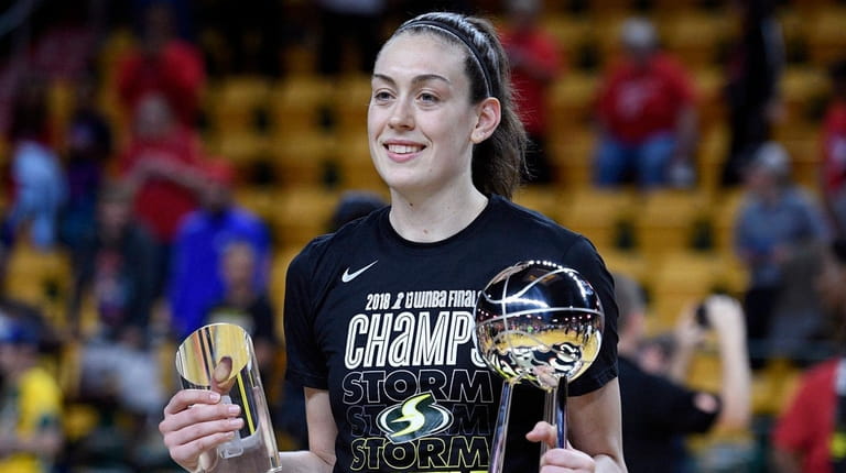 Seattle Storm forward Breanna Stewart poses with the WNBA Finals...