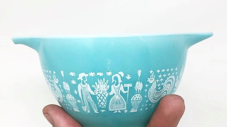 A small, rare Pyrex bowl in the Butterprint pattern bought...