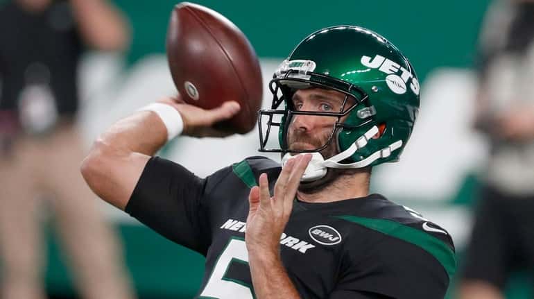 Joe Flacco of the Jets warms up before a game against the...