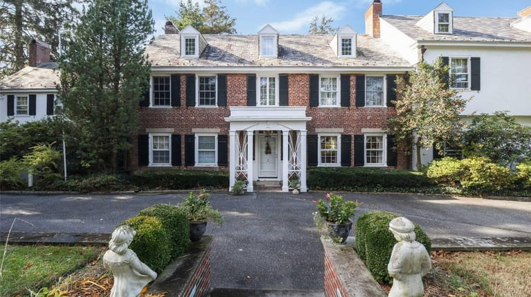 This Sands Point Colonial, for $3.313 million, includes six bedrooms...