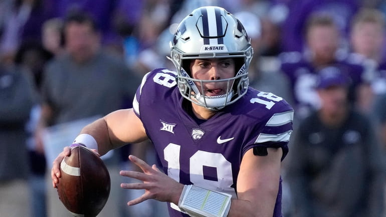 Kansas State quarterback Will Howard looks to pass during the...