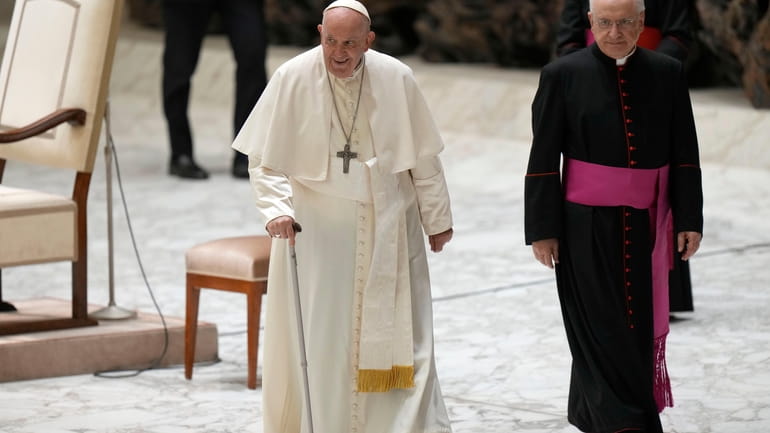 Pope Francis leaves after an audience with the dioceses of...
