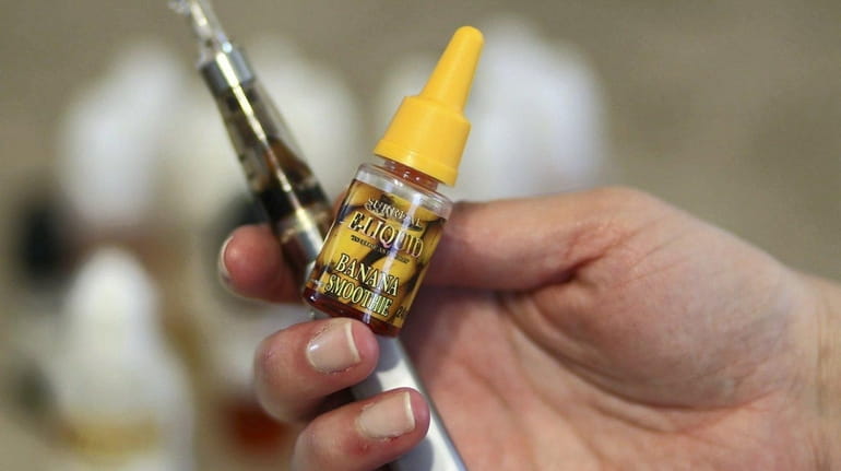 Bottle of flavored liquid for electronic cigarettes in West Sayville.