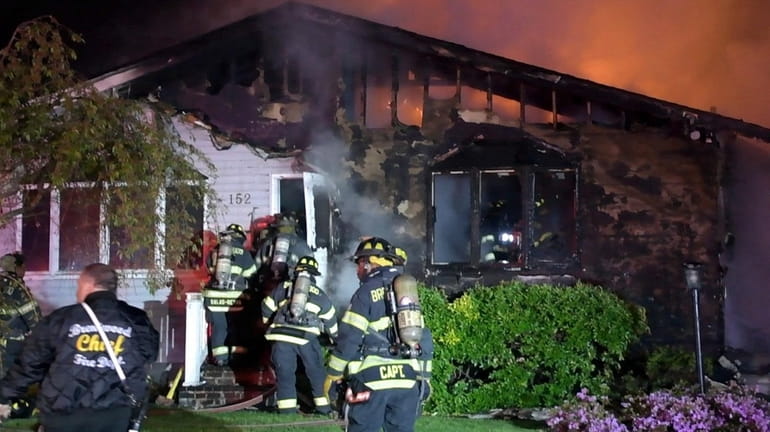 The Brentwood Fire Department responds to a house fire on...