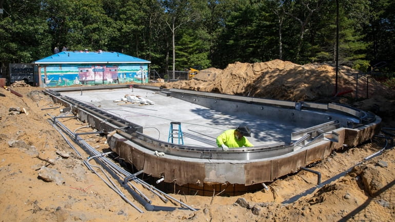 Construction on a new pool is underway at Camp Pa-Qua-Tuck...