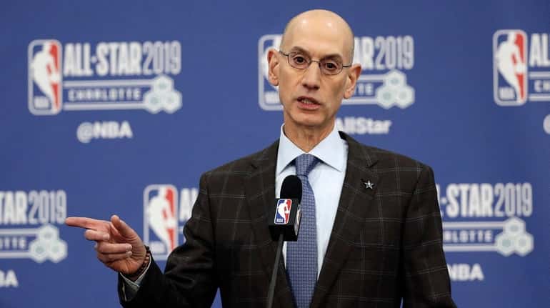 In this Feb. 16, 2019, file photo, NBA Commissioner Adam...