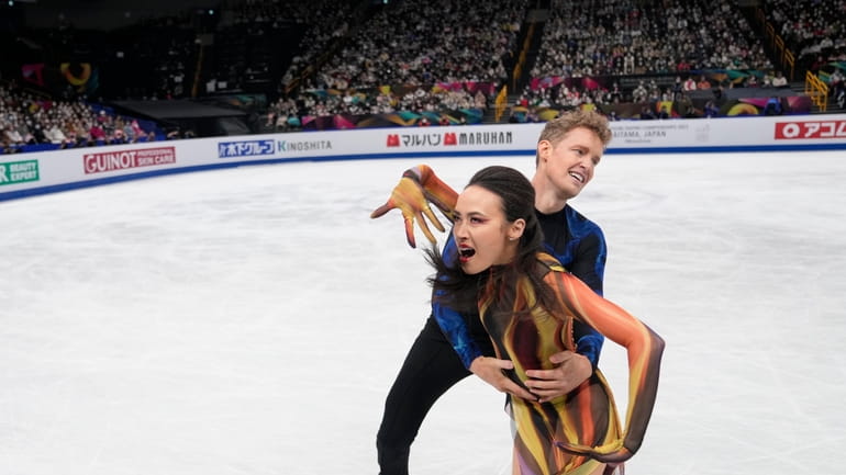 Madison Chock and Evan Bates of the U.S. perform during...