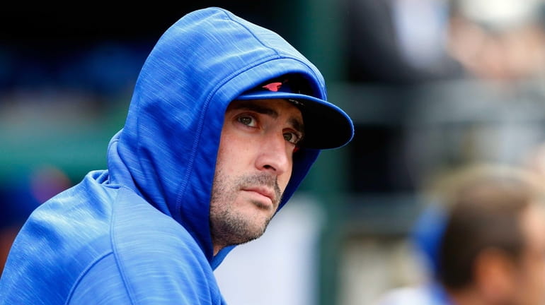 Matt Harvey of the Mets looks on during a game...