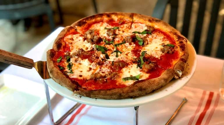At Mangia Bene in Rockville Centre, the Calabrese pizza is...