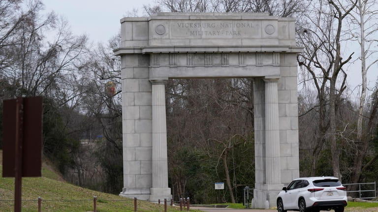 A visitor to Vicksburg National Military Park drives through the...